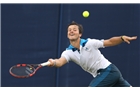 EASTBOURNE, ENGLAND - JUNE 14: James Marsalek of Great Britain plays a forehand against Divij Shran of India during their Men's Singles first round qualifying match on day one of the Aegon International at Devonshire Park on June 14, 2014 in Eastbourne, England.  (Photo by Steve Bardens/Getty Images)